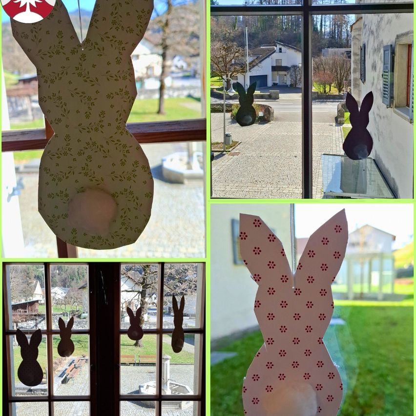 Eine Collage aus vier Bildern zeigt verschiedene Papierhasen an Fenstern. Das erste zeigt einen Hasen, der vor einem Fenster mit Gartenblick silhouettiert ist. Das zweite zeigt eine Einfahrt mit einem Haus und zwei Hasenausschnitten. Das dritte zeigt ein Close-up eines rosa Hasen. Das vierte zeigt drei Hasen, die an einem Fenster hängen.