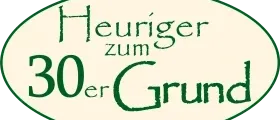 Ein kreisförmiges Logo mit dem Text 'Heuriger zum 30 er Grund' in Grün auf schwarzem Hintergrund.