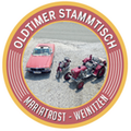 Ein rotes Auto und ein roter Traktor sind in einem kreisförmigen Logo abgebildet mit 'Oldtimer Stammtisch' oben und 'Mariatrost - Weinitzen' unten.