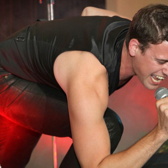 Microphone, Finger, Person, Adult, Male, Man, Solo Performance, Face, Head, Concert