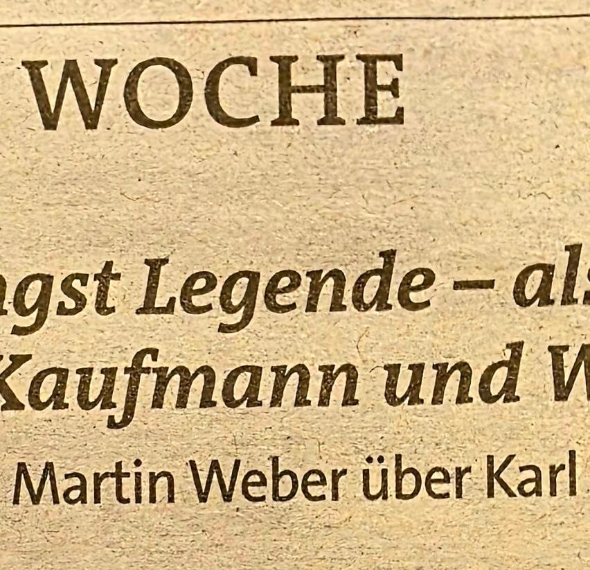 Ein altes Dokument mit Text auf Deutsch, das 'WOCHE', 'algst Legende', 'Kaufmann und W' und 'Martin Weber uber Karl' lautet.