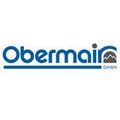 Das Logo von Obermair GmbH zeigt den Firmennamen in blauer Schrift mit einem kleinen Bergsymbol rechts daneben. Der Text ist modern und klar, auf weißem Hintergrund gesetzt.