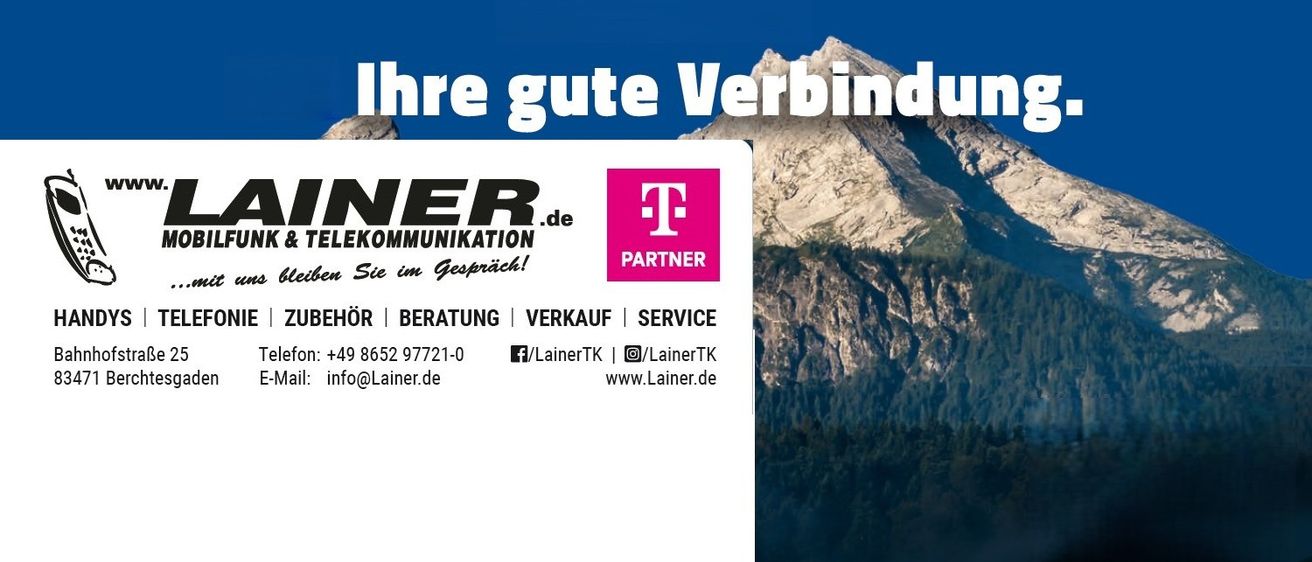 Eine Werbung für Lainer.de zeigt eine Berglandschaft mit blauem Himmel, einem T-Partner-Logo und Kontaktinformationen. Der Text ist auf Deutsch.