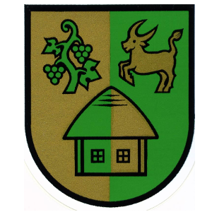 Das Wappen zeigt ein Haus mit einem Strohdach, eine Weinrebe mit grünen Trauben und einen springenden Hirsch.