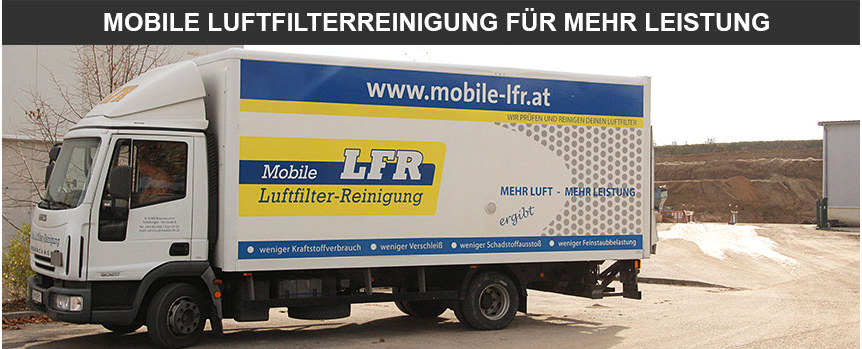 Ein weißer Lkw ist auf einer unbefestigten Straße geparkt, mit einem gelben und blauen Schild, das 'Mobile LFR Luftfilter-Reinigung' und eine Website 'www.mobile-lfr.at' zeigt.