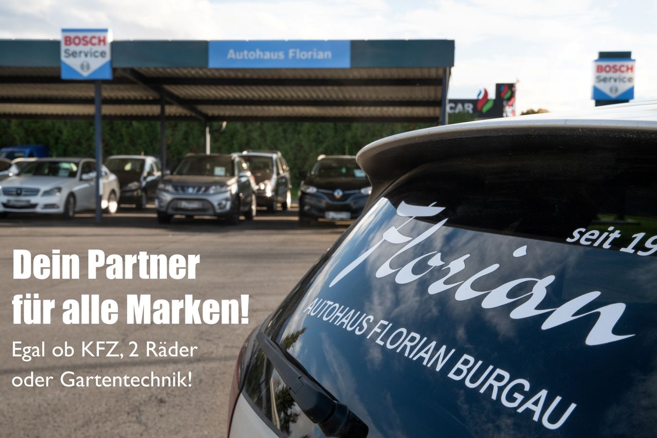 Ein Autohaus mit mehreren Autos unter einem Vordach. Das Schild sagt 'Autohaus Florian' und die Autos haben die gleiche Marke. Das Bild hat einen Wasserzeichen mit Text 'Partner Marken!' und 'Z, 2 Rader, entechnik!'.