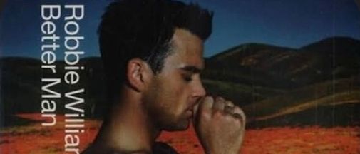 Albumcover von 'Better Man' von Robbie Williams. Ein bärtiger Mann mit Löwentattoo auf der Brust blickt in den Horizont.