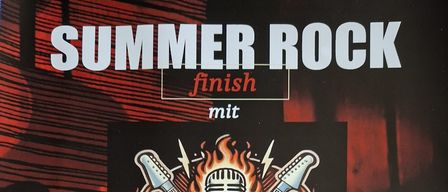 A poster for a live music event featuring the Vintage Fire Rockband. The poster includes a logo with guitars on fire, a microphone, and a flame. The event is scheduled for August 22, 2026, starting at 8:00 PM. Location is Kirchplatz 2, 9141-Eberndorf. Tickets are 10€ and refreshments are included. Bikers are welcome.