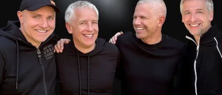 Vier Männer in schwarzen Jacken lächeln für ein Foto. Der Text 'Glanzstucke' steht über ihnen. Unten steht 'Fr.06./Sa.07.02.2026 20:00Uhr dachbodenTheater 2.0'.