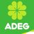 ADEG Logo mit vierblättrigem Kleeblatt auf grünem Hintergrund.