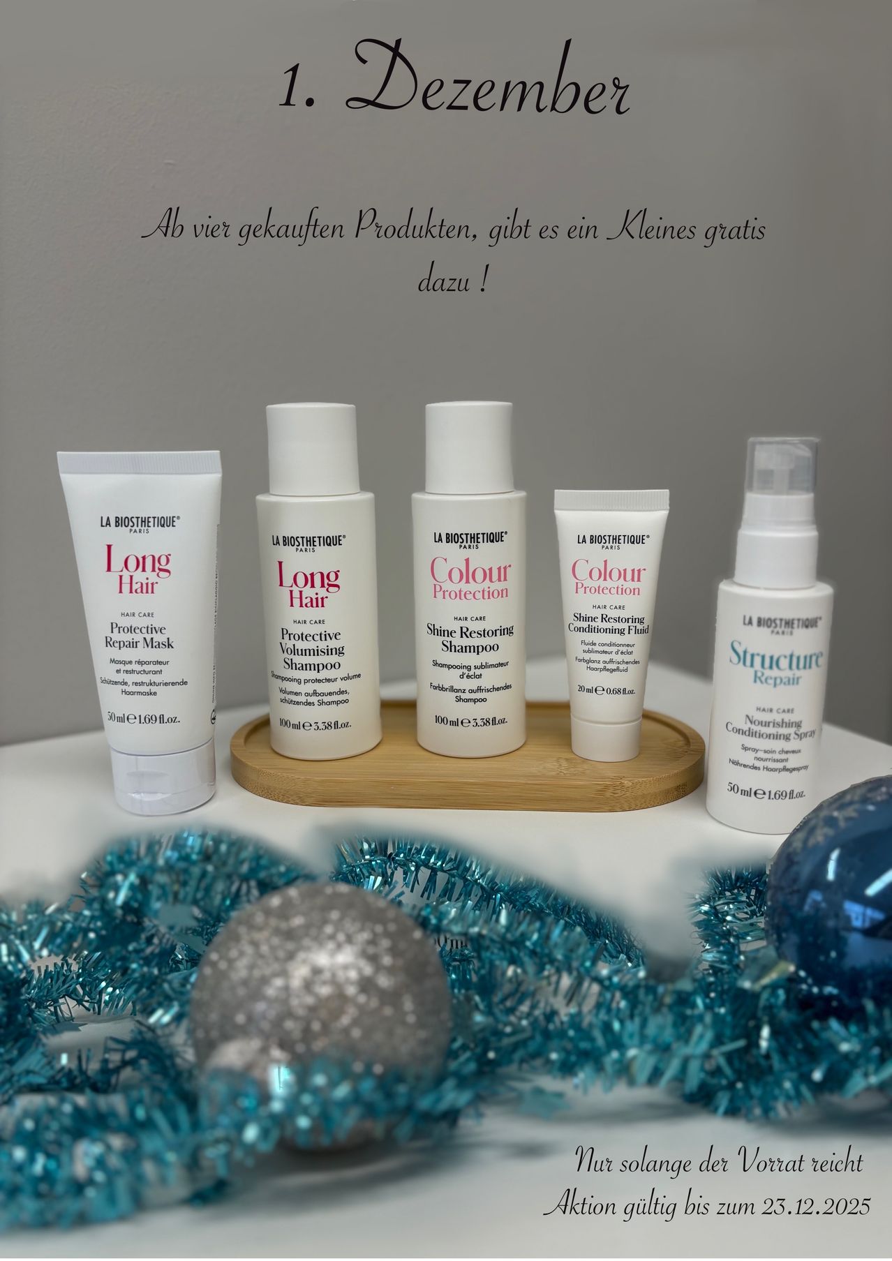 Verschiedene Haarpflegeprodukte von La Biosthetique werden ausgestellt. Produkte umfassen eine Protective Repair Mask, Long Hair Volumising Shampoo, Colour Protection Shine Restoring Shampoo, Colour Protection Conditioning Fluid und Structure Nourishing Conditioning Spray.