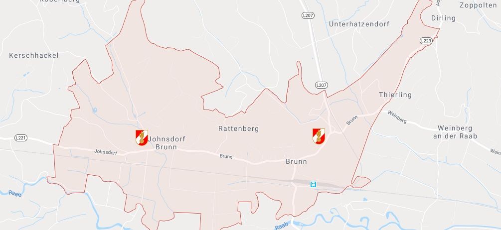 Eine Karte, die zwei Städte, Johnsdor und Brunn, mit ihren Standorten und der umliegenden Gegend hervorhebt. Die Städte sind mit unterschiedlichen Symbolen markiert und von Straßen und Gewässern umgeben.