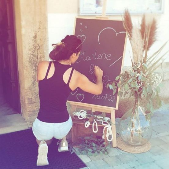 Adult, Female, Person, Woman, Shoe, Blackboard, Plant, Text, Shorts, Table