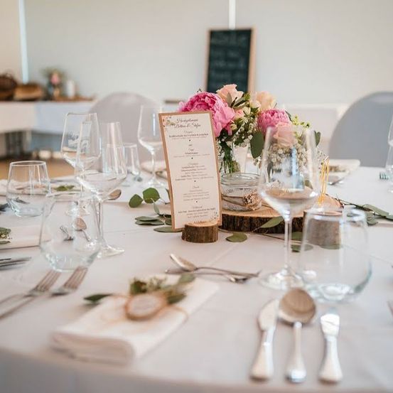 Furniture, Table, Tabletop, Dining Table, Dining Room, Indoors, Fork, Flower, Hall
