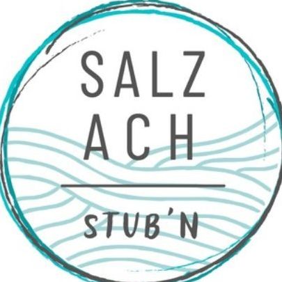 The logo for Salz Ach Stub'n, featuring a circular design with blue waves and black text.