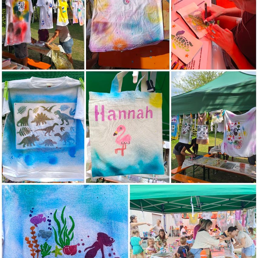 Eine Collage von Bildern, die verschiedene Kunstaktivitäten zeigt. Ein Bild zeigt eine Person, die ein weißes T-Shirt mit Dinosaurier-Designs malt. Ein anderes zeigt eine Tragetasche mit dem Namen 'Hannah' und einem Flamingo-Design. Das letzte Bild zeigt eine Gruppe von Kindern und Erwachsenen, die Kunstaktivitäten unter einem grünen Zelt durchführen.