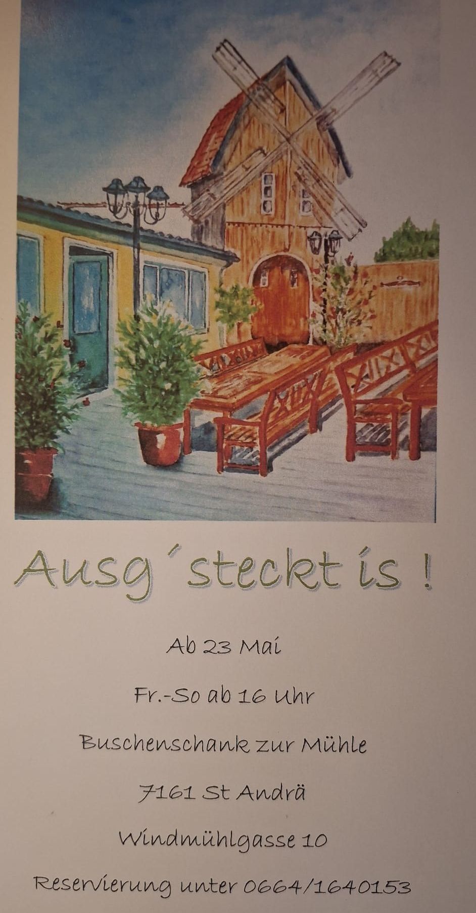 A poster depicts a porch with a house in the background, featuring a wooden bench and table. Potted plants are placed around, and a green door is visible. The message reads 'Ausg steckt is!' with a date below.