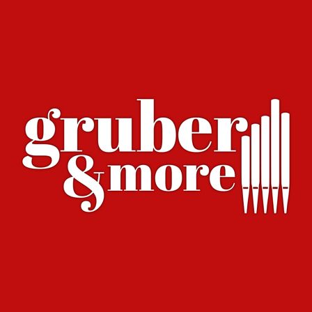 Das Logo für Gruber & More auf rotem Hintergrund. Der Text ist in weiß, 'gruber' in einer größeren Schriftgröße und 'more' in einer kleineren.
