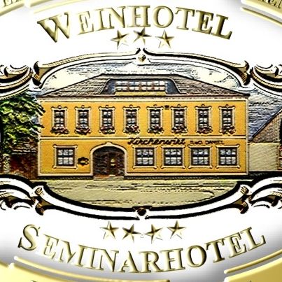 Bild enthält, Logo, Badge, Symbol, Emblem, Architecture, Building, Factory