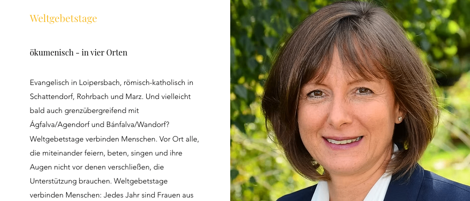 Eine lächelnde Frau mit kurzen braunen Haaren, die ein weißes Hemd und einen marineblauen Blazer trägt, steht vor einem grünen Hintergrund. Sie schaut direkt in die Kamera.
