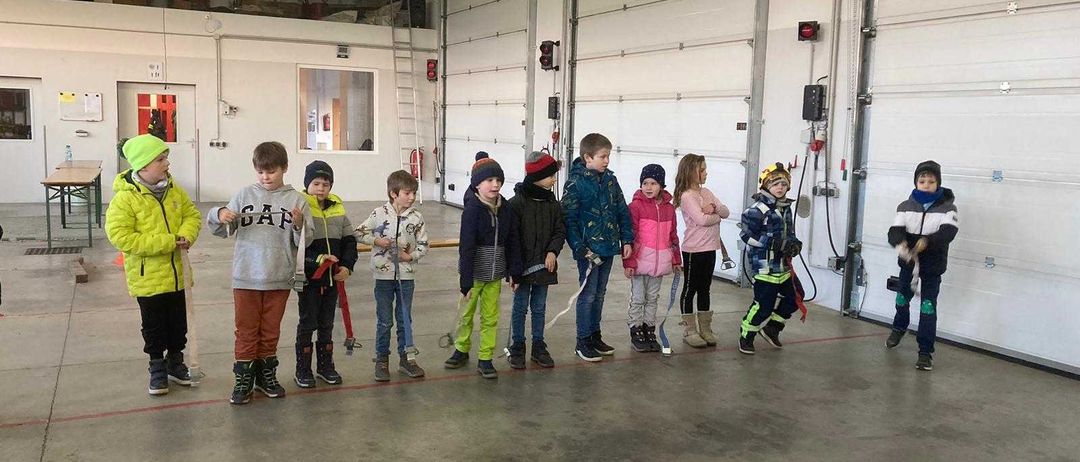 Floor, Person, Boy, Child, Male, People, Jacket, Shoe, Jeans, Indoors