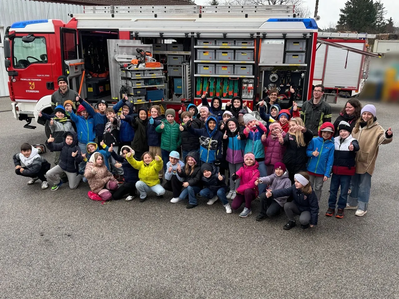 People, Person, Hoodie, Truck, Vehicle, Fire Truck, Fire Station, Shoe, Head, Face