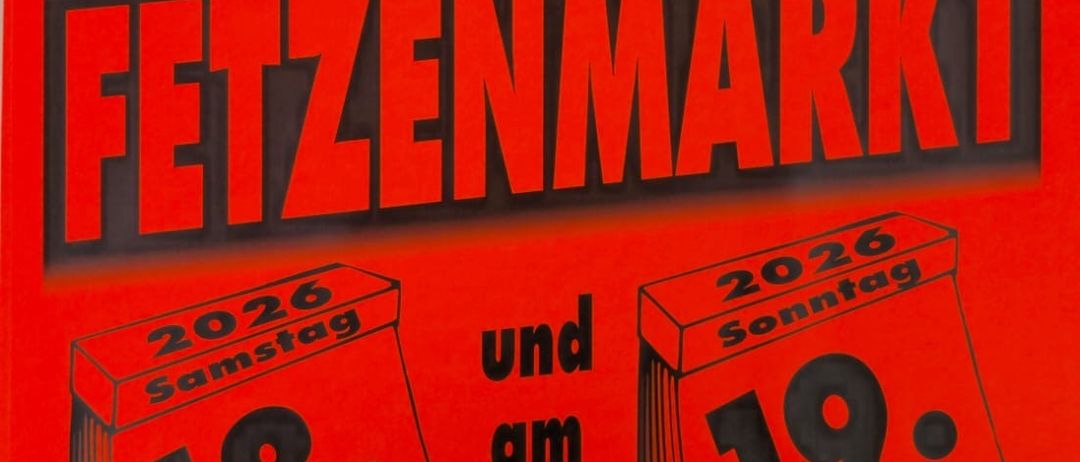 Ein rotes Plakat bewirbt den Grosser Fettenmarkt am 18. und 19. April. Das Plakat zeigt die Termine und Zeiten der Veranstaltung.