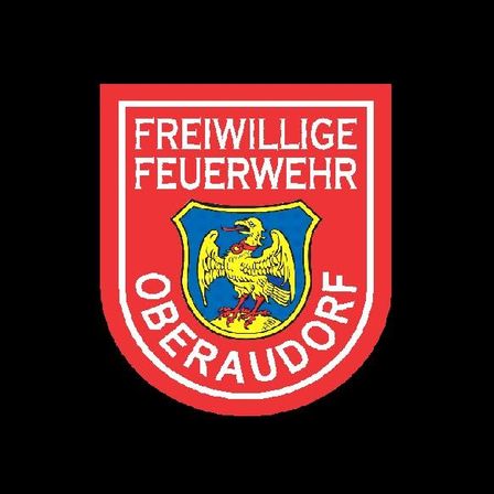 Das Emblem der Freiwilligen Feuerwehr Oberaudorf zeigt einen roten Schild mit einem blau-gelben Adlerwappen, umgeben vom Text 'Freiwillige Feuerwehr Oberaudorf'.