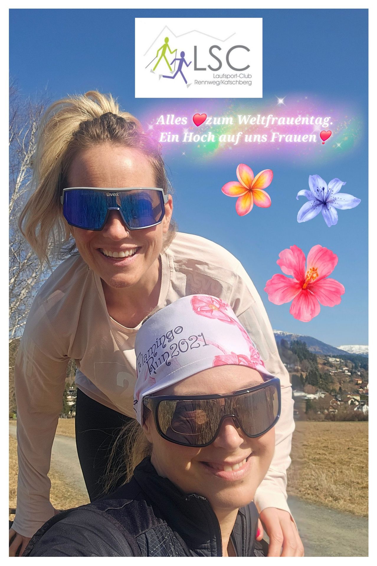Zwei Frauen mit Laufausrüstung lächeln für ein Foto, Berge und ein Dorf im Hintergrund, Textüberlagerung lautet 'Alles zum Weltfrauentag. Ein Hoch auf uns Frauen.'