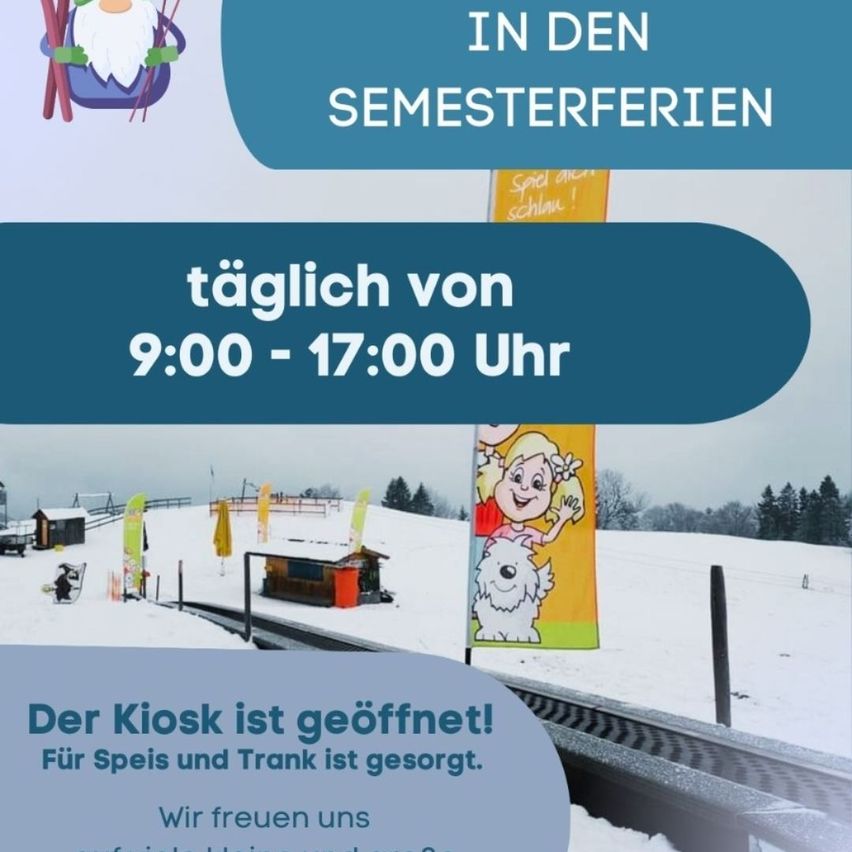Snowy landscape with a small ski resort. A poster reads 'Open in Semesterferien' and 'Daily from 9:00 to 17:00'. A mascot and a sign are displayed. The kiosk is open for food and drinks.