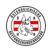 Das Emblem zeigt einen Deutschen Schäferhund vor einem rot-weiß gestreiften Hintergrund, mit den Worten 'Österreichische' darüber und 'Rettungshundebrigade' darunter.