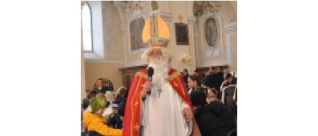 Plakat für eine Kirchenveranstaltung mit einem Bild von St. Nikolaus, Ankündigung seines Besuchs in der Basilika am 7. Dezember 2025 um 10:00 Uhr.