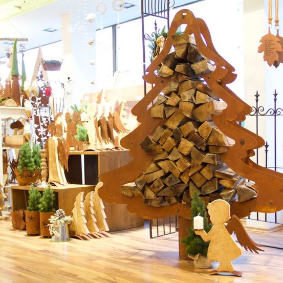 Image contains, Wood, Building, Plant, Shop, Person, Christmas, Christmas Decorations, Festival