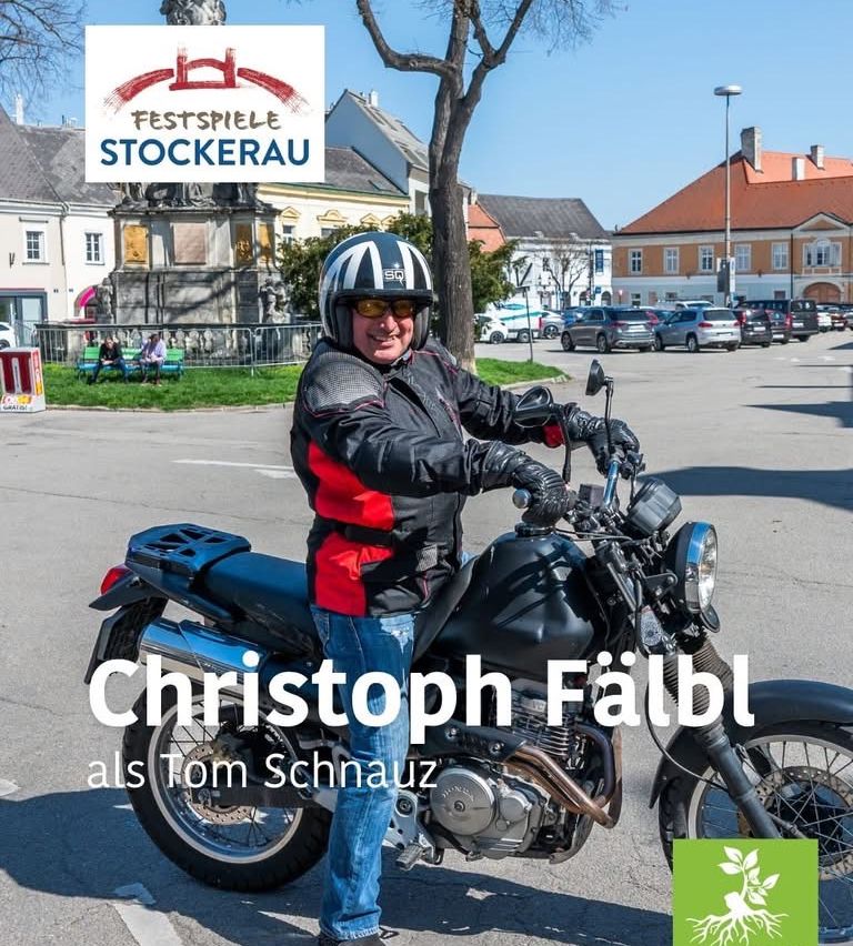 A man poses next to a motorcycle with the text Christoph Faulbl, with a festival logo in the top left corner.