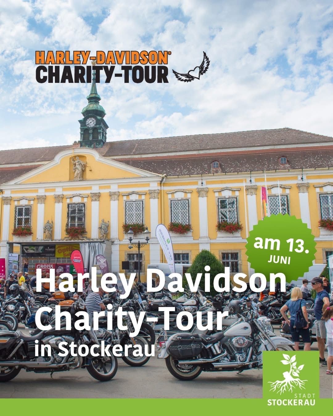 A Harley-Davidson charity tour in Stockerau with many motorcycles parked in front of a yellow building with a clock tower.