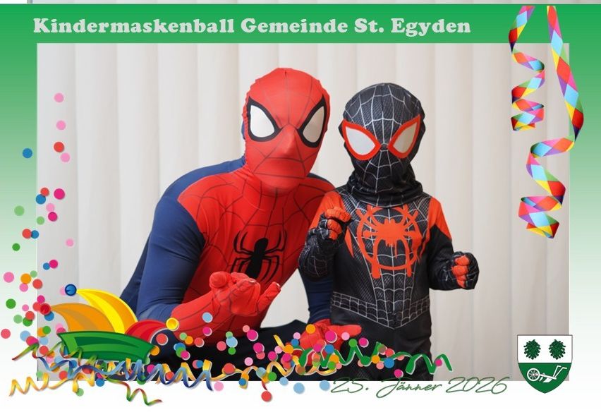 Zwei Personen in Spider-Man-Kostümen posieren für ein Foto mit Konfetti und einem Banner mit der Aufschrift Kindermaskenball Gemeinde St.Egyden. Das Datum 25. Januar 2026 wird angezeigt.