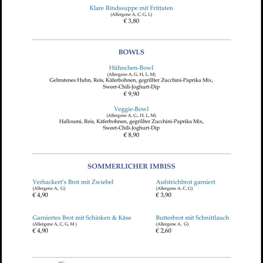 The menu features a chicken bowl with rice, zucchini, paprika, and sweet chili yogurt dip, priced at €9.90. A vegetarian bowl with halloumi, rice, and the same dip is also available at €8.90. Summer options include a garlic bread and a buttered bread with cheese, priced at €4.90 and €2.60 respectively.