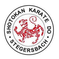 Das Logo für Shotokan Karate Do St. Egidius Stegersbach zeigt einen roten Tiger in der Mitte, umgeben von den Worten 'SHOTOKAN KARATE DO STEGERSBAC' in einem kreisförmigen Design.