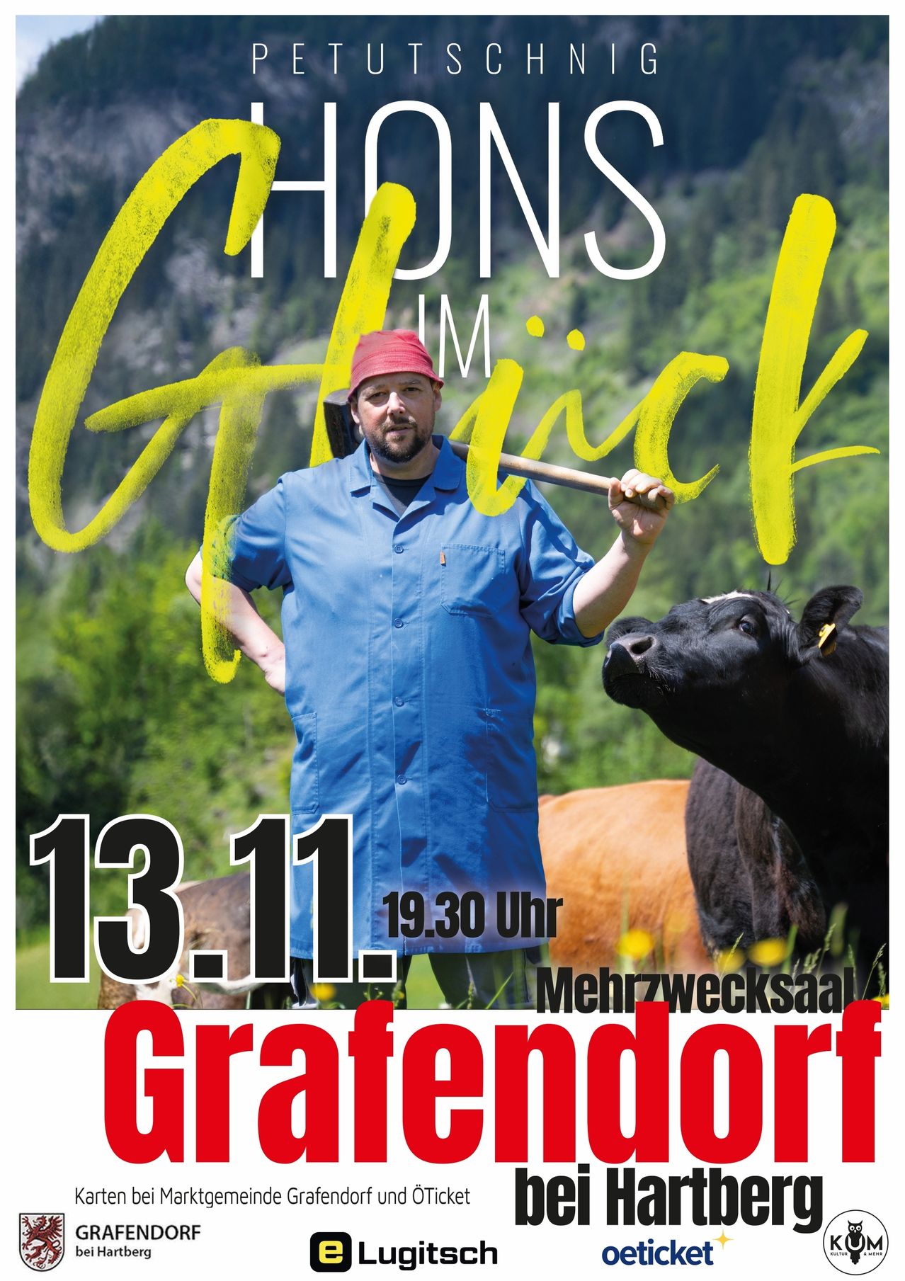 A man in a blue shirt and red hat holds a sledgehammer, standing next to a black cow in a field. The image has a yellow and black text overlay with the date and time.