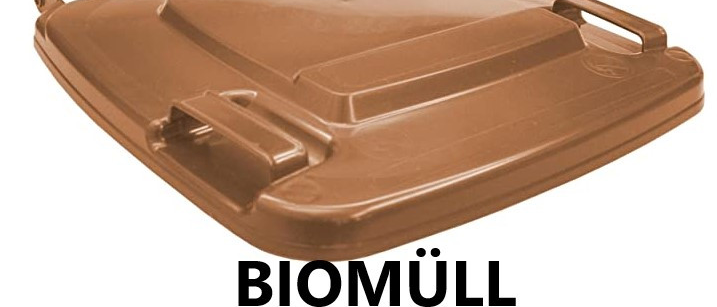 Ein brauner Plastik-Mülleimerdeckel mit Griffen wird auf weißem Hintergrund gezeigt. Der Deckel ist mit 'BIOMUELL' beschriftet.