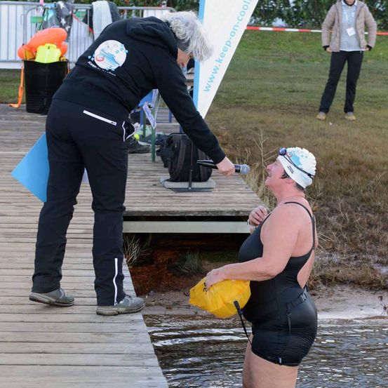 Bild enthält, Waterfront, Cap, Hat, Coat, Adult, Female, Person, Woman, Pier, Man