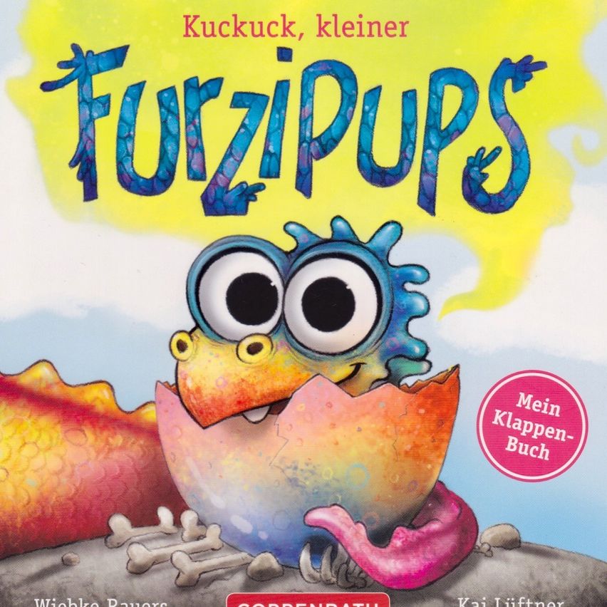 Ein farbenfrohes, drachenähnliches Wesen schlüpft aus einem gecrackten Ei mit einem fröhlichen Gesicht, umgeben von Knochen und Felsen. Der Titel lautet 'FurziPups'.