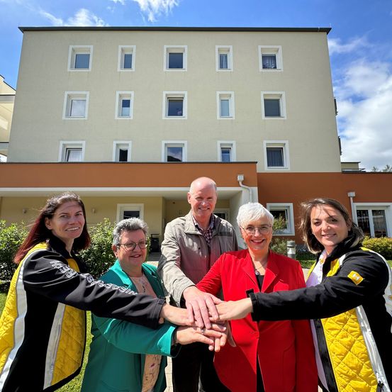 Image contains, People, Person, Photography, Portrait, Coat, Condo, Neighborhood, Grass, Villa, Woman