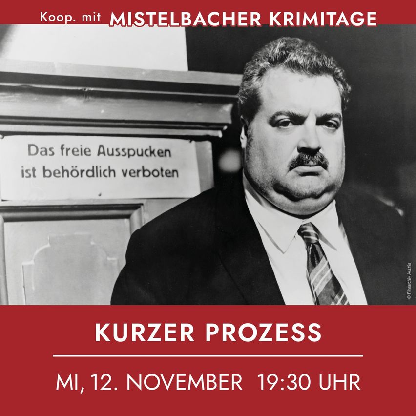 A black and white photo shows a man in a suit and tie with a serious expression. Above him is a sign that reads, 'Das freie Ausspucken ist behördlich verboten'. Below him is a red banner with the text, 'Kurzer Prozess, Mi, 12. November 19:30 Uhr'.