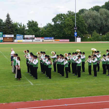 Bild enthält, People, Person, Marching, Group Performance, Leisure Activities, Music, Music Band, Musical Instrument, Musician, Performer