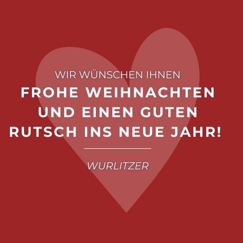 Ein rotes Herz mit weißem Text sagt: 'Wir wünschen Ihnen frohe Weihnachten und einen guten Rutsch ins neue Jahr!' Unten steht 'WURLITZER'.