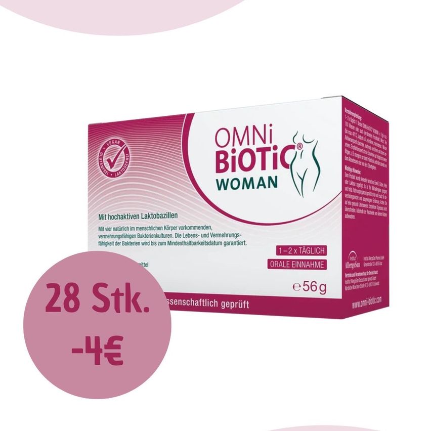 Eine Schachtel Omni Biotic Woman Probiotika-Ergänzung mit einem rosa-weißen Etikett, enthält 28 Tabletten, empfohlen für die Gesundheit und das Wohlbefinden von Frauen.
