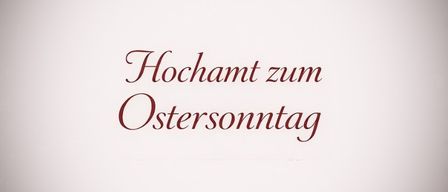 Das Bild zeigt braunen Text, der 'Hochamt zum Ostersonntag' auf weißem Hintergrund liest. Der Text ist elegant und ist wahrscheinlich Teil einer Einladung oder Ankündigung für einen Gottesdienst.