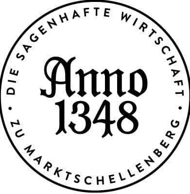 Ein kreisförmiges Logo mit schwarzem Text 'Anno 1348' in der Mitte, umgeben von den Worten 'Die sagenhafte Wirtschaft' in einer stilisierten Schrift und 'Marktschelleberg' unten rechts.
