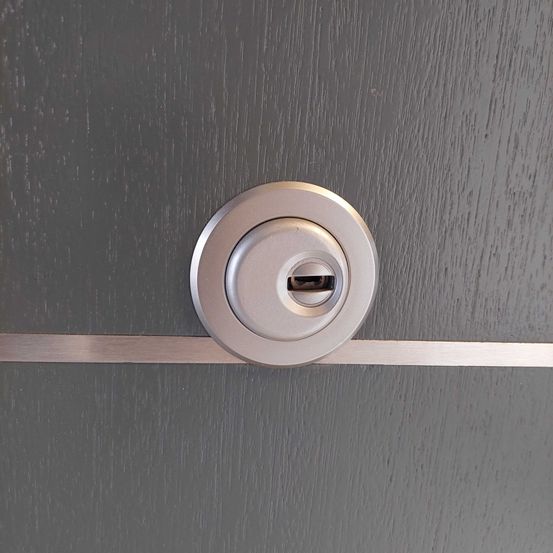 Bild enthält, Handle, Tape, Indoors